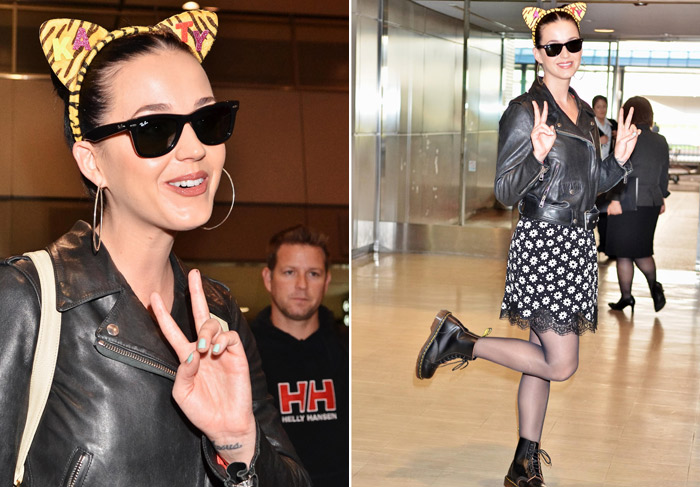 Katy Perry usa tiara de gatinho em aeroporto no Japão