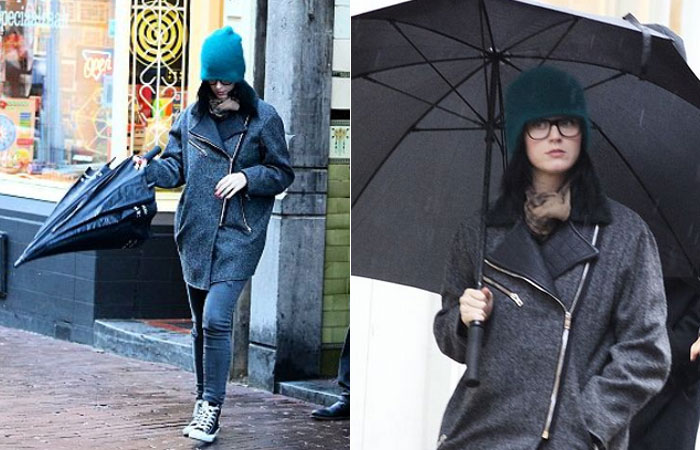 Katy Perry circula por Amsterdam de óculos escuros e gorro