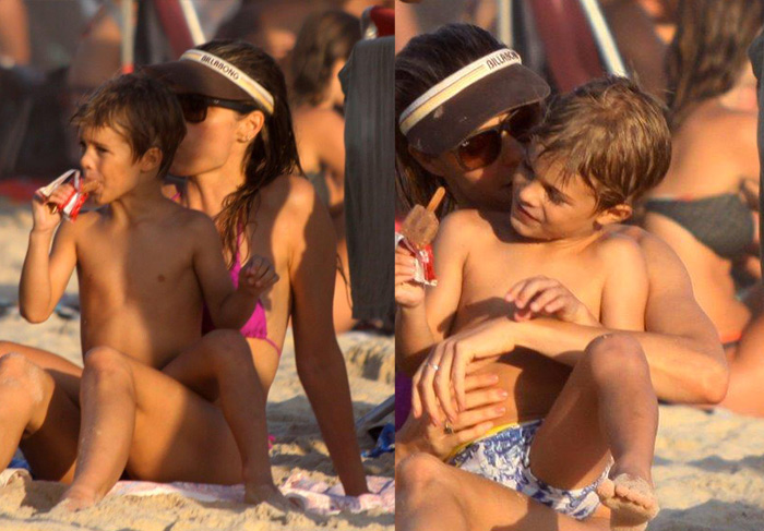 Fernanda Lima curte o pôr do sol na praia, com o filho