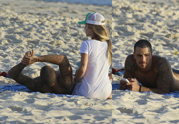 Felipe Titto curte tarde romântica com a mulher, na praia