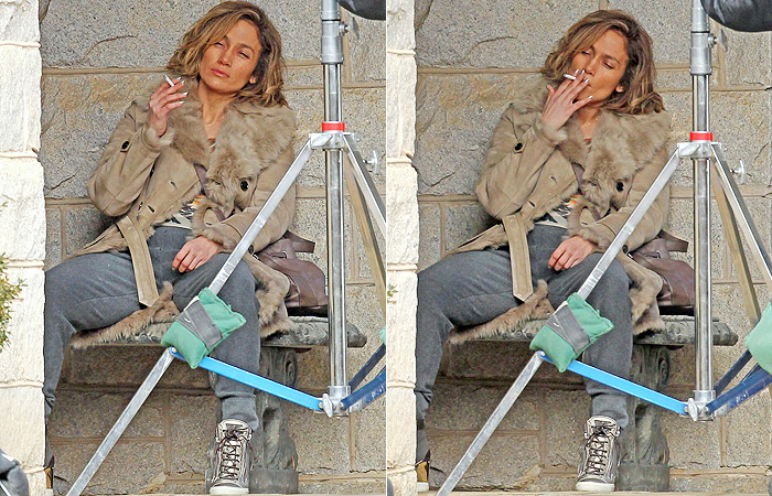 Jennifer Lopez aparece toda largada e fumando um cigarro em set 