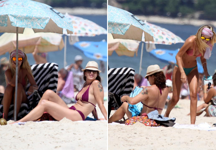 Yasmin e Luiza Brunet tomam sol e conversam na praia de Ipanema