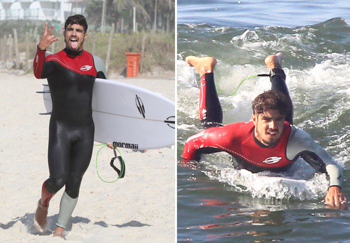 Caio Castro pega onda na praia da Macumba