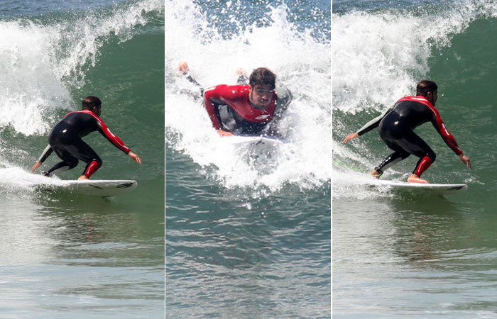 Caio Castro tem mais um dia de surfe na praia de Grumari 