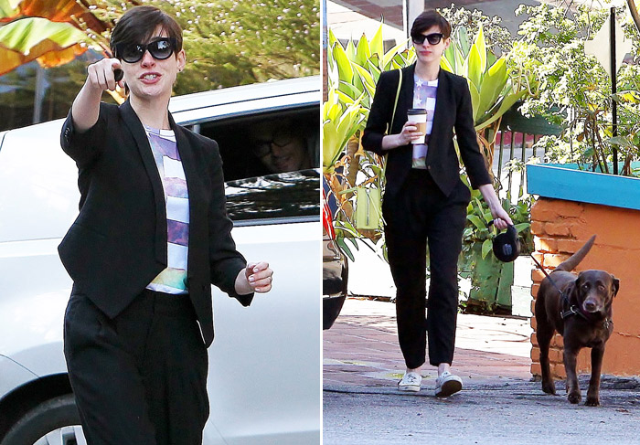 Anne Hathaway discute com fotógrafos em Los Angeles