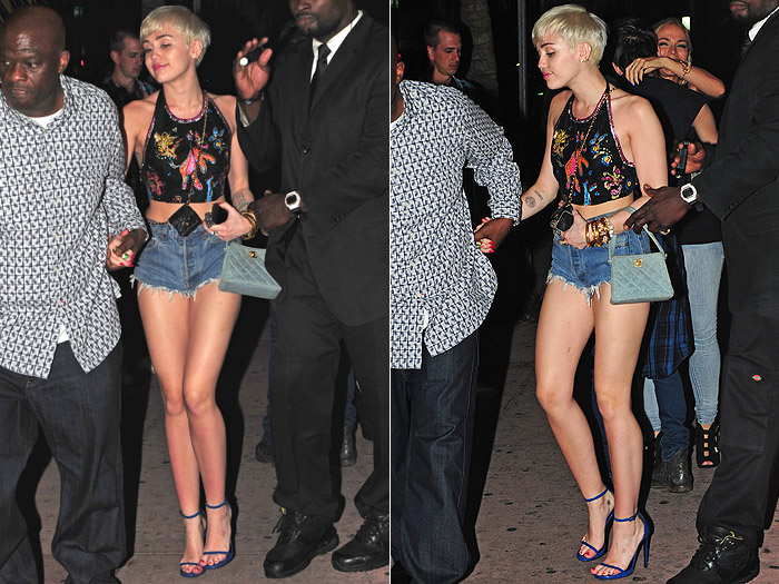  Miley Cyrus comemora turnê em Miami com shortinho minúsculo