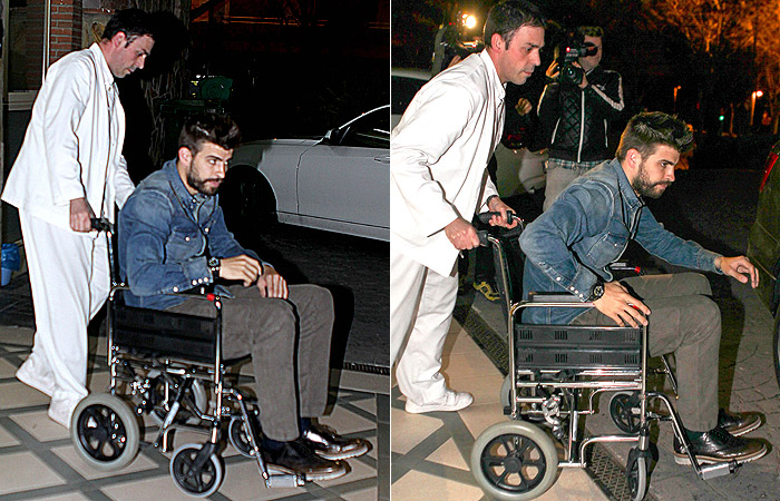  Marido de Shakira deixa hospital em cadeira de rodas