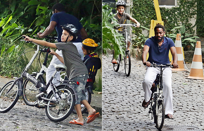 Lázaro Ramos leva o filho para andar de bike pelo Jardim Botânico, no Rio