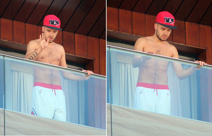 One Direction curte piscina no hotel e Liam Payne acena para fãs da sacada