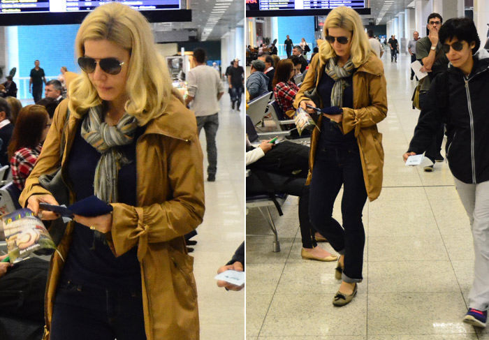 Com look de inverno, Paula Toller embarca no Rio de Janeiro