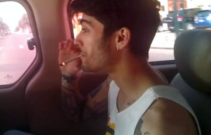 Zayn Malik e Louis Tomlison são filmados dividindo um suposto cigarro de maconha