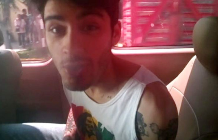 Zayn Malik e Louis Tomlison são filmados dividindo um suposto cigarro de maconha