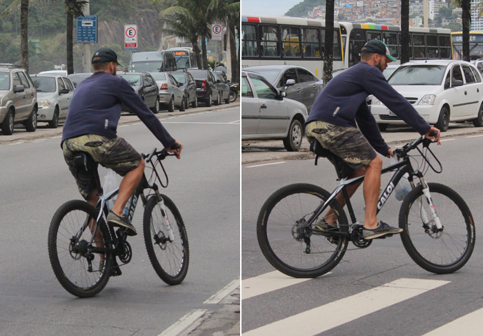 Barbudo, Rodrigo Hilbert pedala pelas ruas do Leblon, no Rio