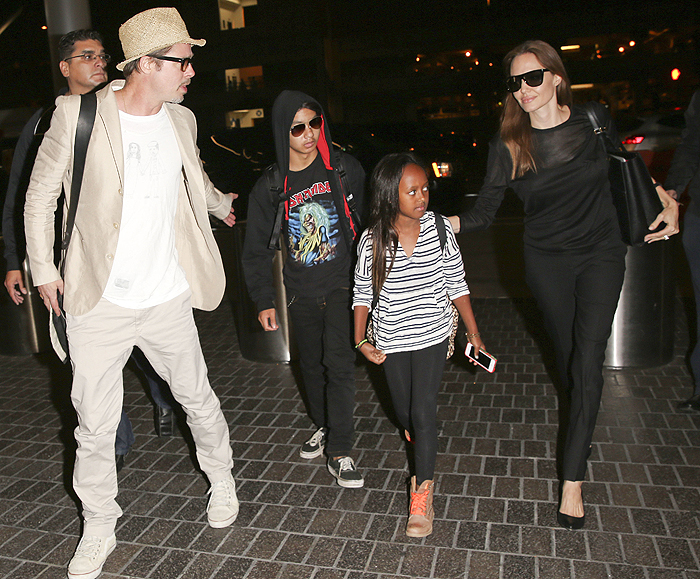 Estiloso, Brad Pitt desembarca em Los Angeles com Angelina Jolie