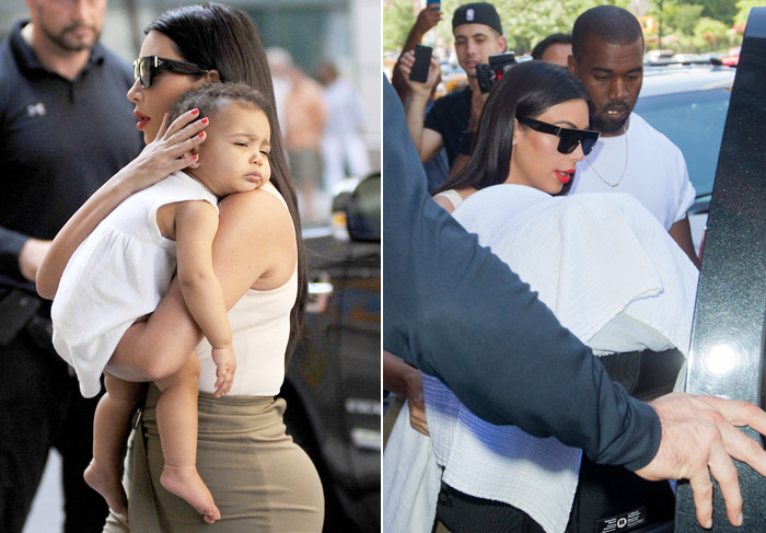 Com cara de sono, North West é clicada no colo de Kim Kardashian