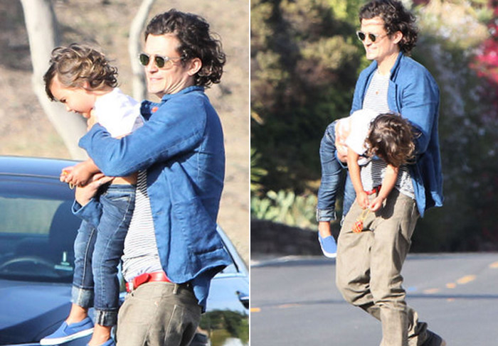 Orlando Bloom passeia com o filho por Malibu