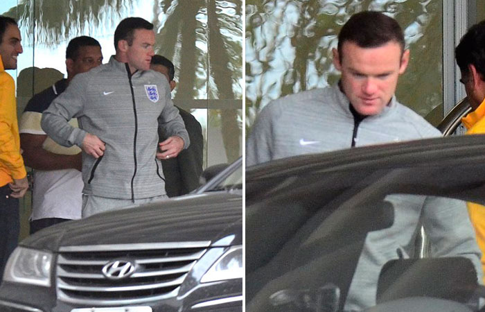  Rooney, jogador da Inglaterra, deixa hotel em São Conrado