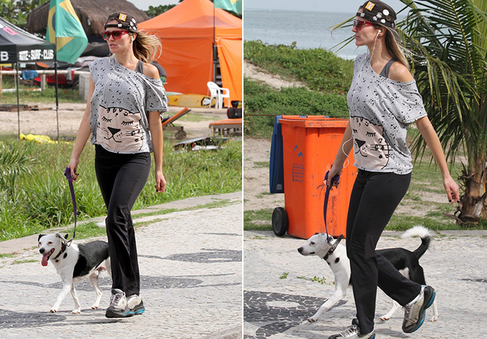 Em dia frio, Ellen Jabour passeia com seu pet na Barra da Tijuca