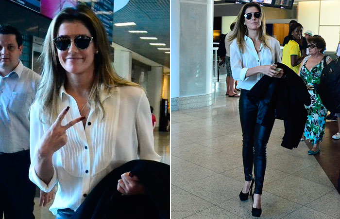 Cheia de estilo, Deborah Secco decola do Rio de Janeiro