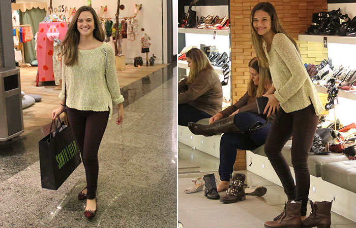  Simpática, Juliana Paiva acena para fotógrafos em shopping carioca