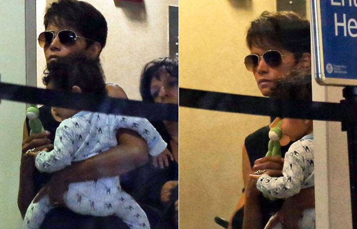 No aeroporto, Halle Berry desembarca com o filho Maceo, de pijaminha