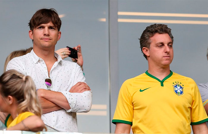 Ashton Kutcher e Luciano Huck sofrem com jogo do Brasil