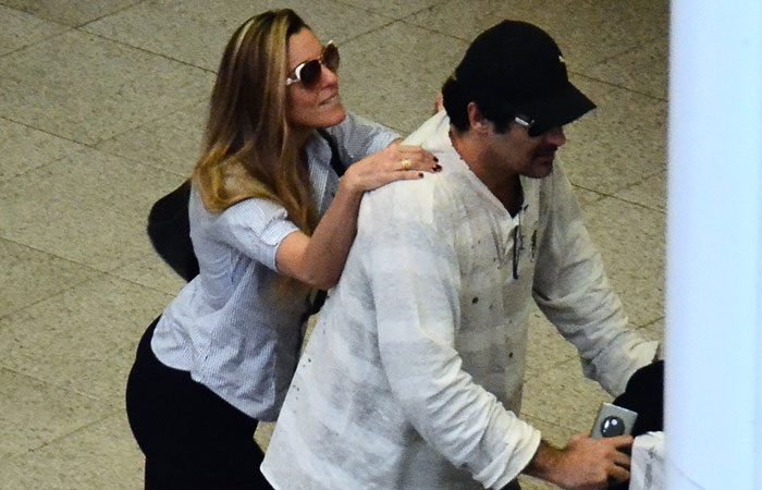  Luciano Szafir chega ao Rio de Janeiro com a namorada