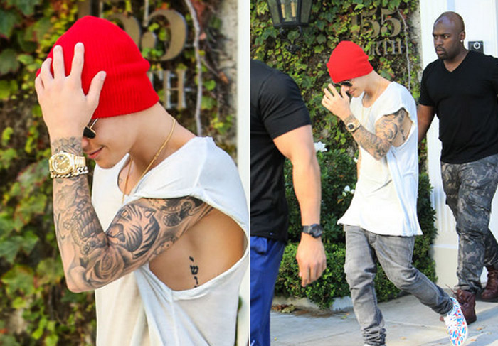 Cheio de charme, Justin Bieber tenta se esconder dos paparazzi