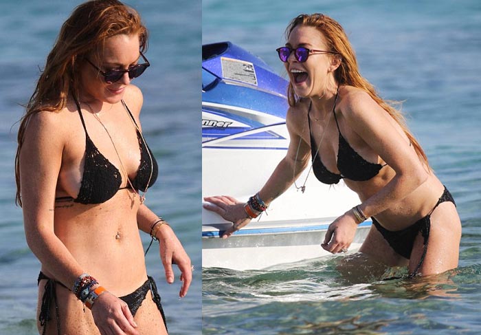 De biquíni preto, Lindsay Lohan curte o mar da Grécia 