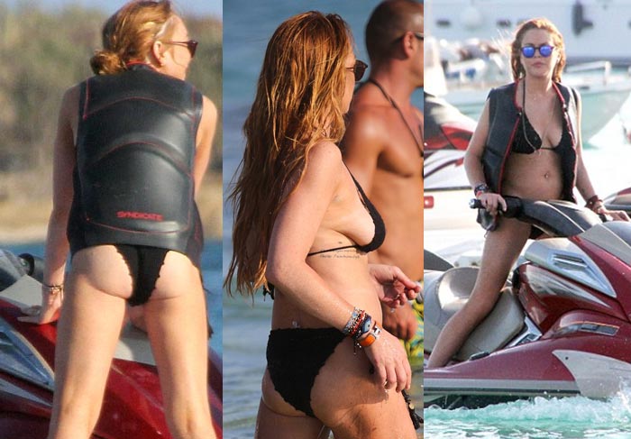 De biquíni preto, Lindsay Lohan curte o mar da Grécia 