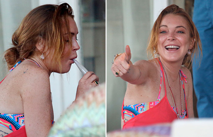 Lindsay Lohan fuma narguilé em praia na Grécia