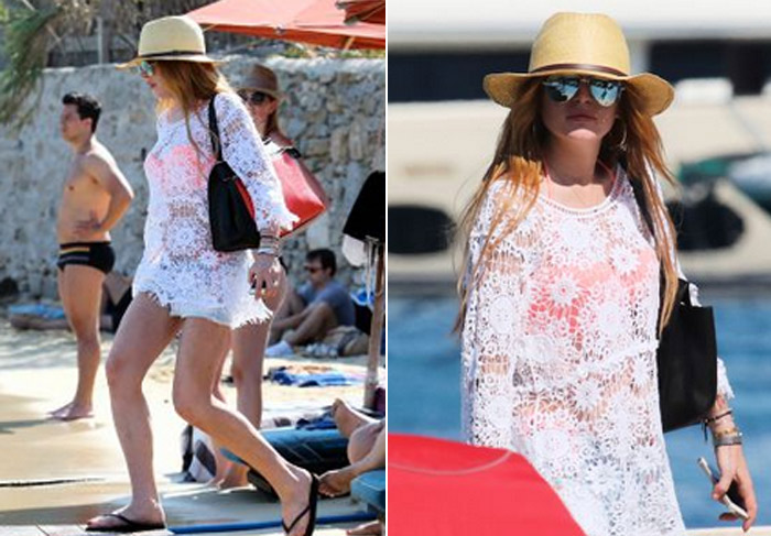 Lindsay Lohan desfila com roupa de renda por Mykonos para evitar cliques indiscretos