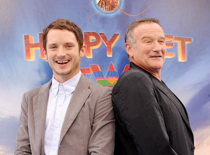 Elijah Wood e Robin Williams na pré-estreia de Happy Feet Dois em Hollywood, na California