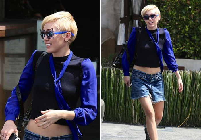 Miley Cyrus passeia de barriga de fora e óculos excêntricos em Los Angeles