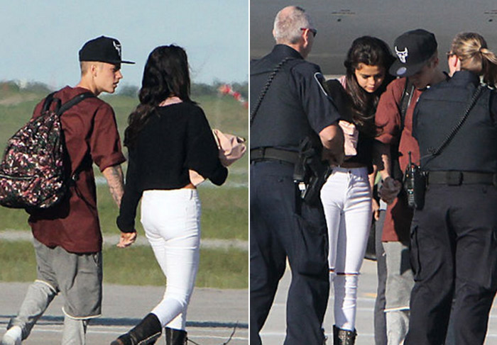 Justin Bieber passeia de mãos dadas com Selena Gomez em aeroporto