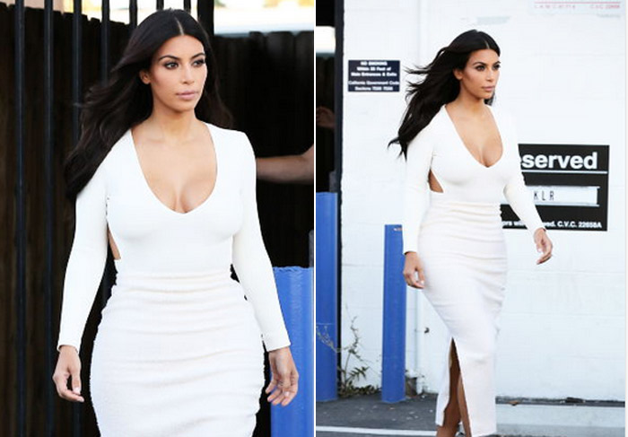 Kim Kardashian usa vestido decotado durante passeio por Los Angeles