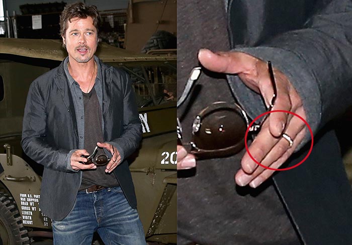 Usando aliança, Brad Pitt posa para fotos promocionais de novo filme