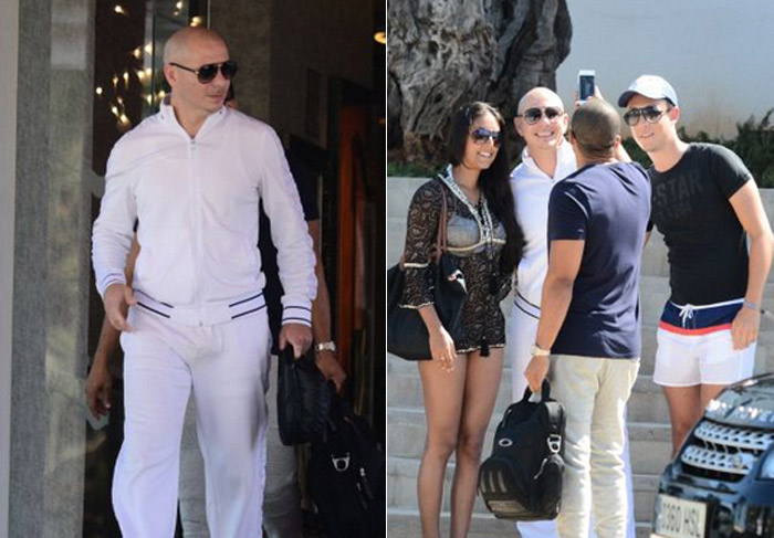 Pitbull dá show de simpatia e atende fãs na porta de seu hotel em Ibiza, na Espanha