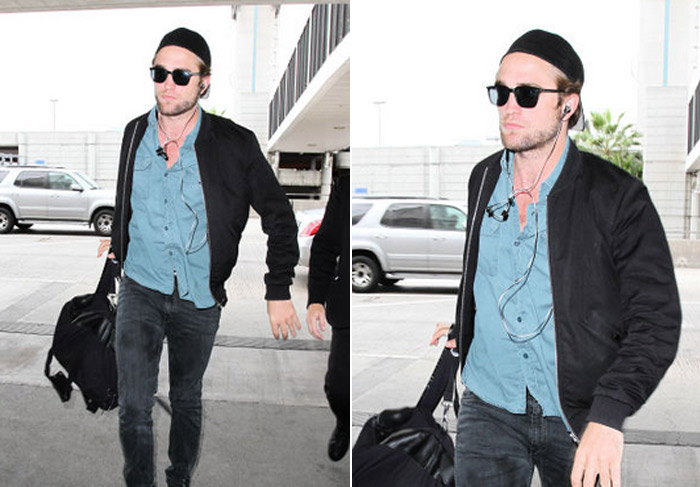 Robert Pattinson chega todo estiloso a aeroporto de Los Angeles