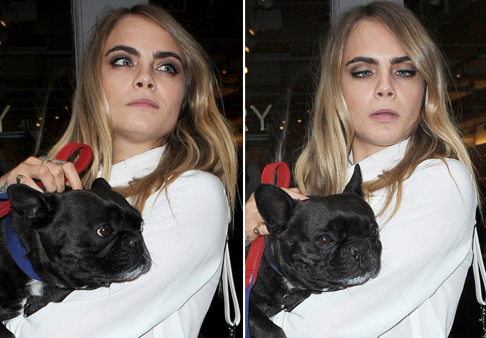 Cara Delevingne deixa hotel, em Nova York, com seu cachorro no colo