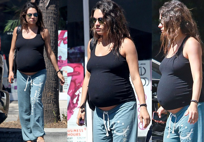 Com barrigão de 9 meses, Mila Kunis caminha por Los Angeles