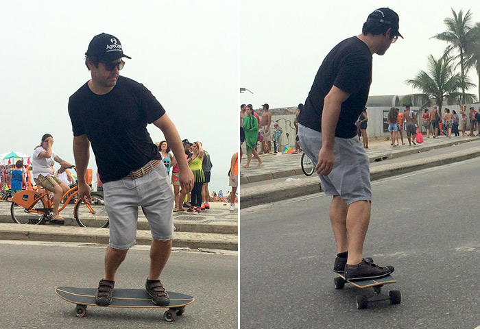 Murilio Benício anda de skate com o filho na orla da Barra da Tijuca