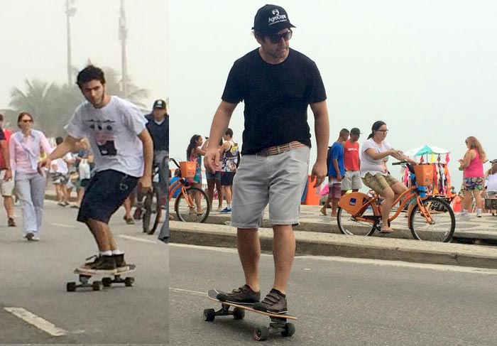 Murilio Benício anda de skate com o filho na orla da Barra da Tijuca