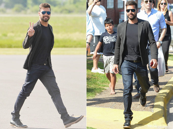 Ricky Martin acena aos fãs ao desembarcar na Argentina