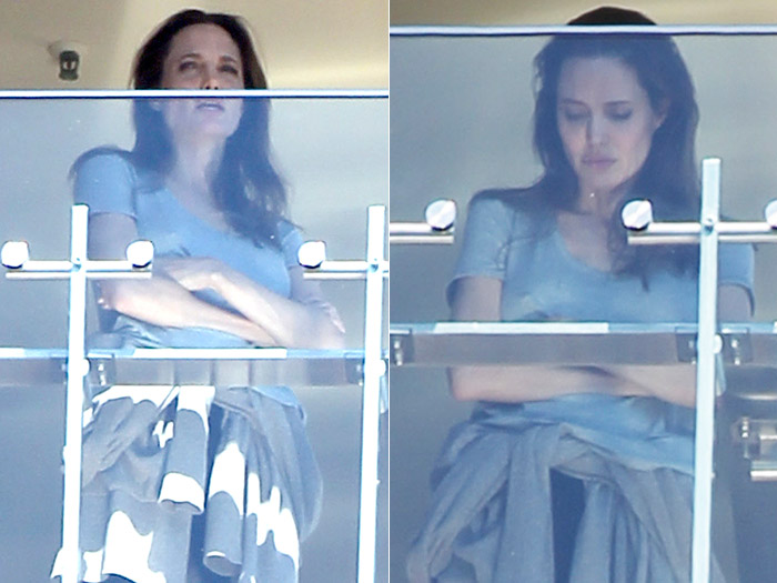 Angelina Jolie surge com aparência triste na sacada de hotel em Sydney,