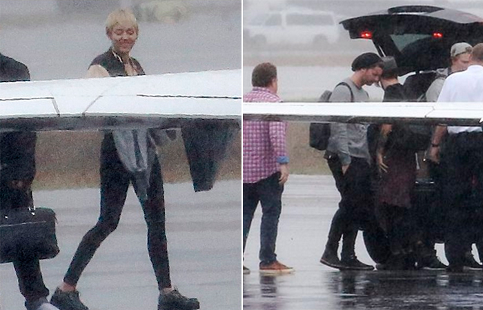  Miley Cyrus e Patrick Schwarzenegger embarcam em jatinho particular