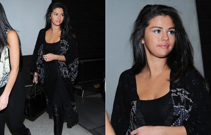Selena Gomez esbanja elegância até para viajar de avião