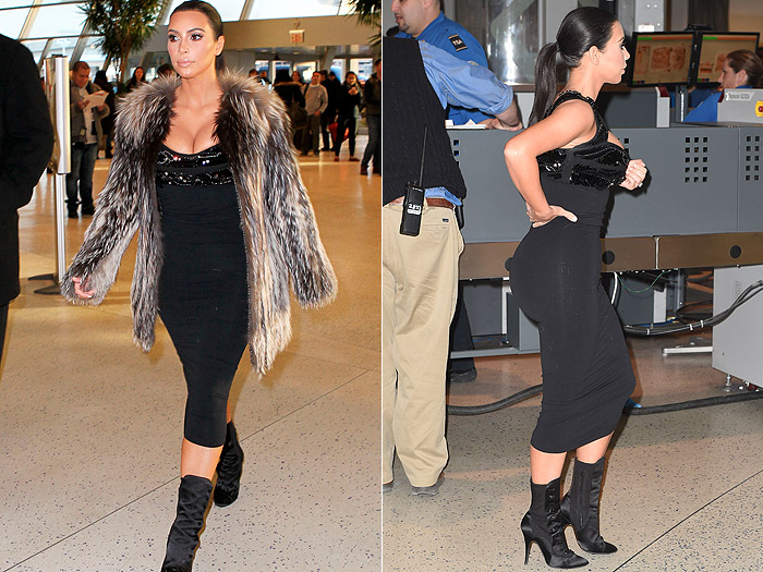 Bumbum e decote de Kim Kardashian chamam a atenção em aeroporto