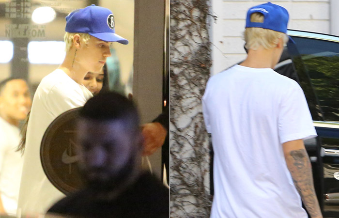 Ainda com cabelo platinado, Justin Bieber faz compras em loja da Nike