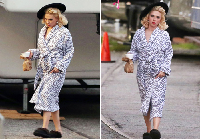 Cheia de glamour, Scarlett Johansson surge de roupão e pantufas em set de filmagem
